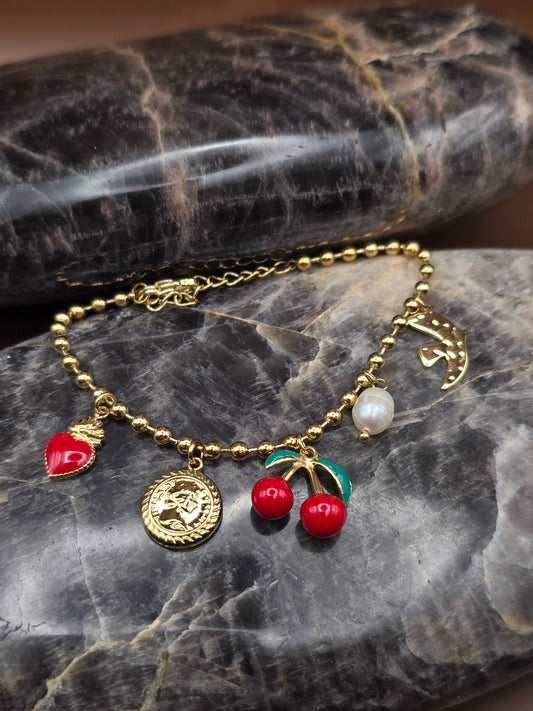 Collier doré charms “cerise”