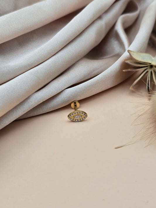 Piercing Œil protecteur – Titane & Zirconium